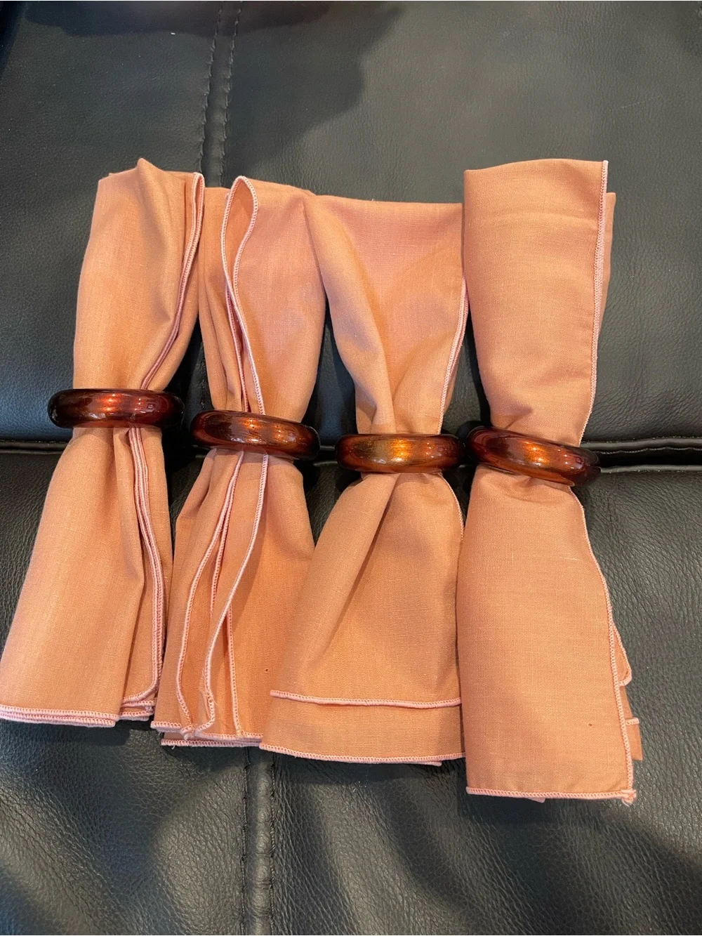 Set of 4 Peach Cloth Napkins with Amber Ring Holders
